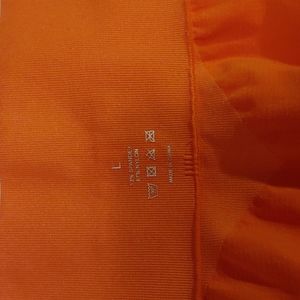 NVGTN Size L Sunset Orange Leggings